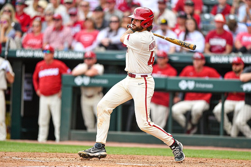 Arkansas catcher Parker Rowland (44) hits a go-ahead RBI single, Sunday, April 2, 2023, during the sixth inning of the Razorbacks’ 5-4 series-clinching win over Alabama at Baum-Walker Stadium in Fayetteville. Visit nwaonline.com/photo for today's photo gallery..(NWA Democrat-Gazette/Hank Layton)