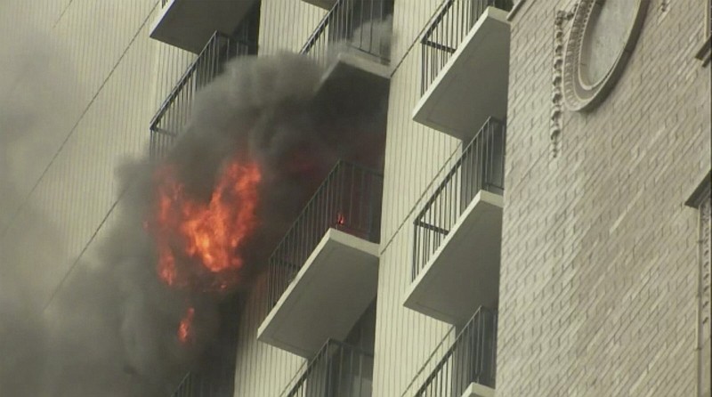 Flames shoot out of the window of a high-rise building in Chicago on Wednesday.
(AP/C 7 Chicago WLS)