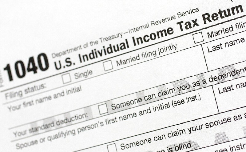 A portion of the 1040 U.S. Individual Income Tax Return form is shown in New York in this July 24, 2018 file photo. (AP/Mark Lennihan)