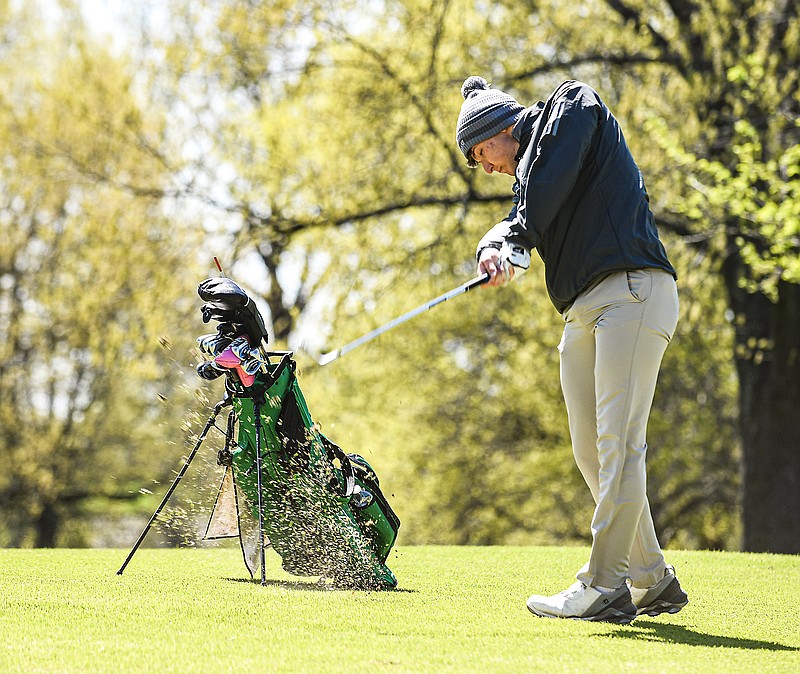 Sam Kliethermes of Blair Oaks follows through on his shot on the 16th hole Monday, April 17, 2023, in the Helias Invitational at Jefferson City Country Club. (Julie Smith/News Tribune photo)