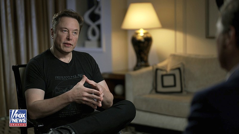 In this image released by FOX News, Elon Musk gestures as he is interviewed by FOX News host Tucker Carlson on Thursday, April 13, 2023. The billionaire Twitter owner told Carlson in a segment aired Monday night, April 17, that he plans to create an alternative to the popular AI chatbot ChatGPT that he is calling “TruthGPT,” which will be a "maximum truth-seeking AI that tries to understand the nature of the universe.” (FOX News via AP)