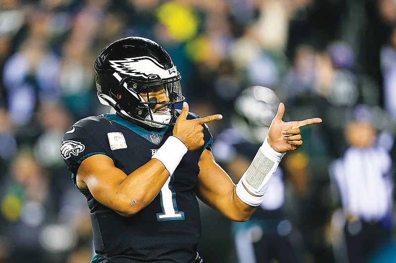 In this Nov. 27, 2022, file photo, Eagles quarterback Jalen Hurts celebrates a touchdown run by Kenneth Gainwell during a game against the Packers in Philadelphia. (Associated Press)