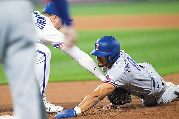 Rangers top Royals 40 after deGrom exits with sore wrist Rangers top Royals 40 after deGrom exits with sore wrist