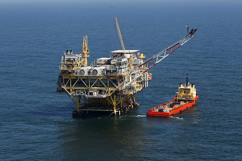 An offshore rig and supply vessel in the Gulf of Mexico, off the cost of Louisiana, is shown in this April 10, 2011 file photo. Republican-leaning states and Republicans in Congress are pushing for more offshore oil and gas leases. (AP/Gerald Herbert)