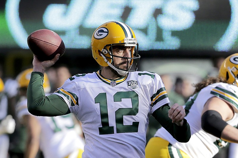 FILE - Green Bay Packers quarterback Aaron Rodgers throws a pass against the New York Jets during the first half of an NFL football game, Sunday, Dec. 23, 2018, in East Rutherford, N.J.