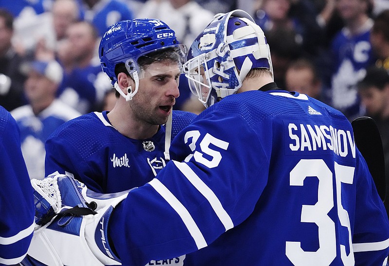 IN PHOTOS: John Tavares faces off against Leafs teammate in