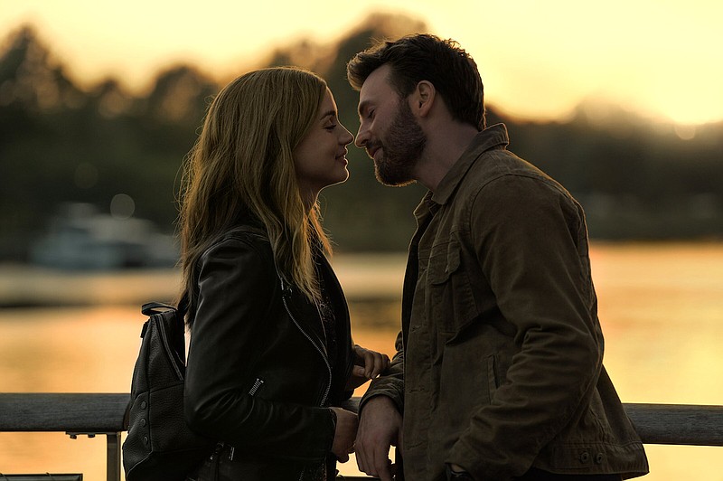 International woman of mystery Sadie Rhodes (Ana de Armas) captures the heart of earnest, lovestruck farmer Cole Turner (Chris Evans) in the Apple TV + thriller “Ghosted.”