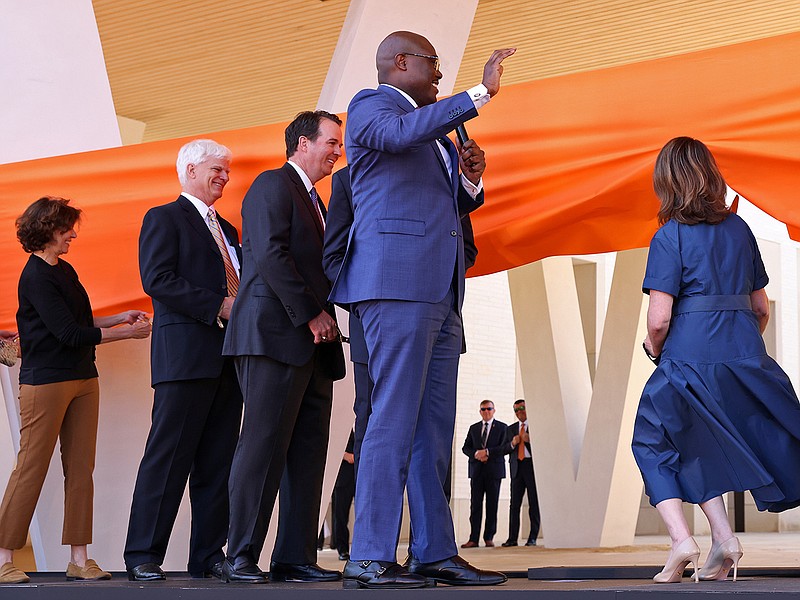 Dignitaries including Little Rock Mayor Frank Scott Jr., center, participate in the ribbon-cutting at the grand reopening ceremony for the Arkansas Museum of Fine Arts on Saturday, April 22, 2023. See more photos at arkansasonline.com/423amfa/ (Arkansas Democrat-Gazette/Colin Murphey)