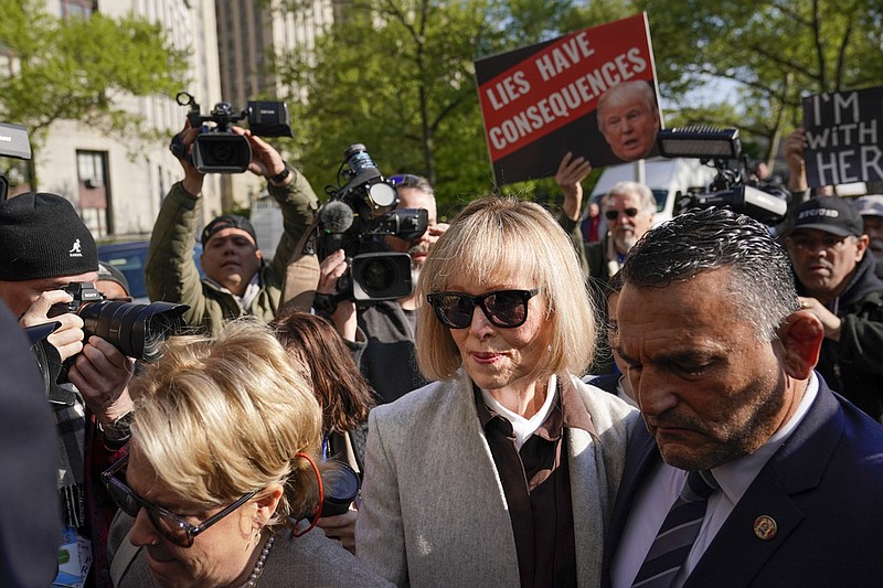 Former advice columnist E. Jean Carroll walks into Manhattan federal court on Tuesday, April 25, 2023, in New York.  Jury selection is scheduled to begin in a trial over Carroll's claim that former President Donald Trump raped her nearly three decades ago in a department store dressing room.  (AP Photo/Seth Wenig)