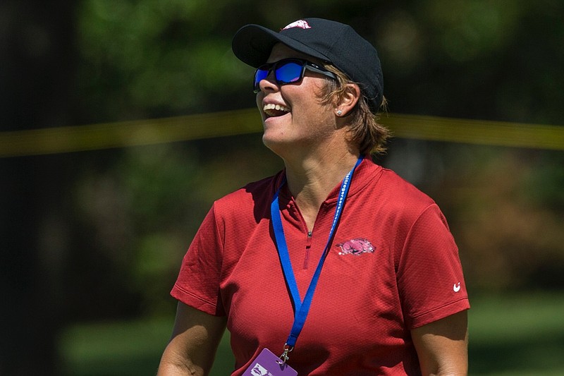 Shauna Taylor, Arkansas women's golf head coach, works with current and former Arkansas golfers on hole 8 Tuesday, June 25, 2019, during the practice round for the LPGA Walmart Northwest Arkansas Championship at Pinnacle Country Club in Rogers.