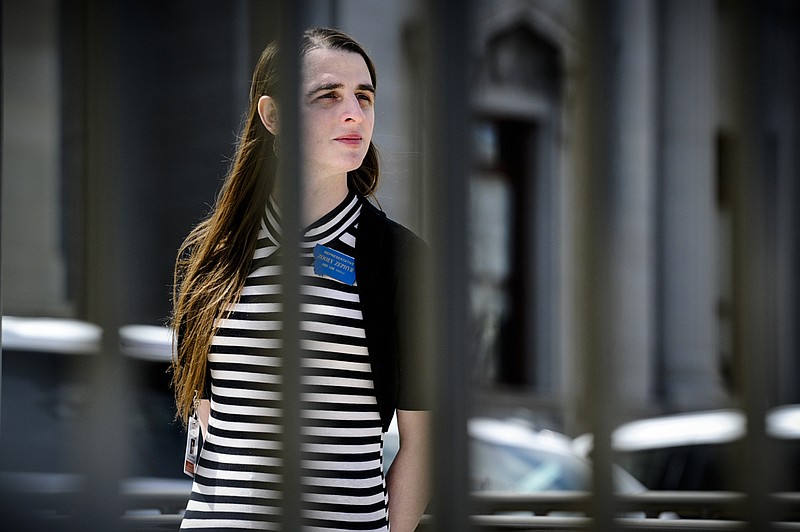 Rep. Zooey Zephyr, D-Missoula, stands on the steps of the Montana State Capitol during a rally, in Helena, Mont., Monday, April 24, 2023. Republican legislative leaders in Montana persisted in forbidding the Democratic transgender lawmaker from participating in debate for a second week as her supporters brought the House session to a halt Monday, chanting "Let her speak!" from the gallery before they were escorted out. (Thom Bridge/Independent Record via AP)