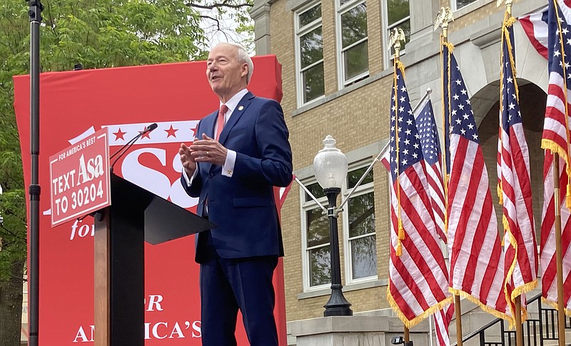 Former Arkansas governor Asa Hutchinson Wednesday, April 26, 2023 at his campaign for president formal announcement at the Bentonville Square. (NWA Democrat-Gazette/FLIP PUTTHOFF)