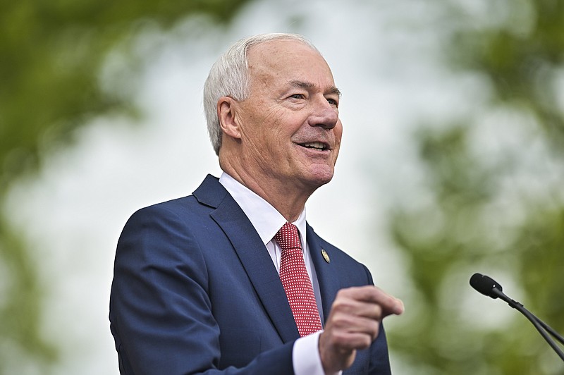 Asa Hutchinson speaks, Wednesday, April 26, 2023 at the downtown square in Bentonville. Former two-term Arkansas governor Asa Hutchinson formally announced his campaign for president. Visit nwaonline.com/photos for today's photo gallery...(NWA Democrat-Gazette/Charlie Kaijo)