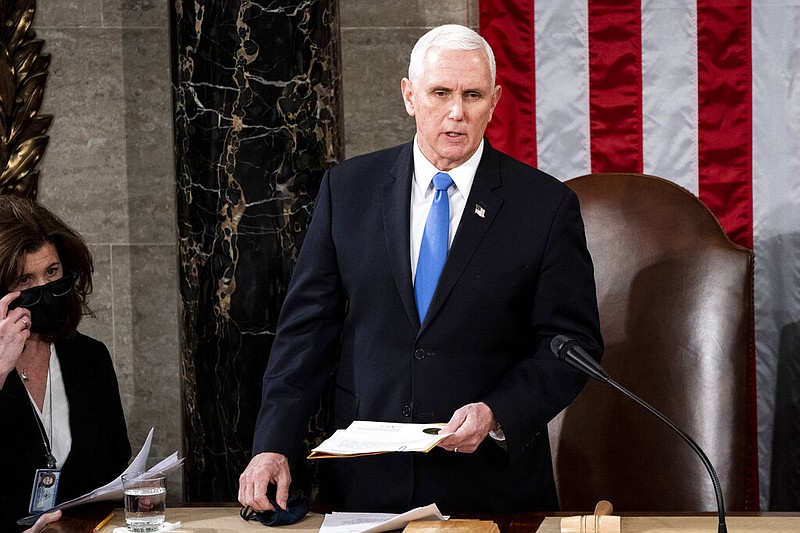 Then-Vice President Mike Pence officiates as a joint session of the House and Senate convenes at the Capitol in Washington in this Jan. 6, 2021 file photo. Lawmakers were meeting to confirm the Electoral College votes cast in the November 2020 presidential election. (Erin Schaff/The New York Times via AP, Pool, File)