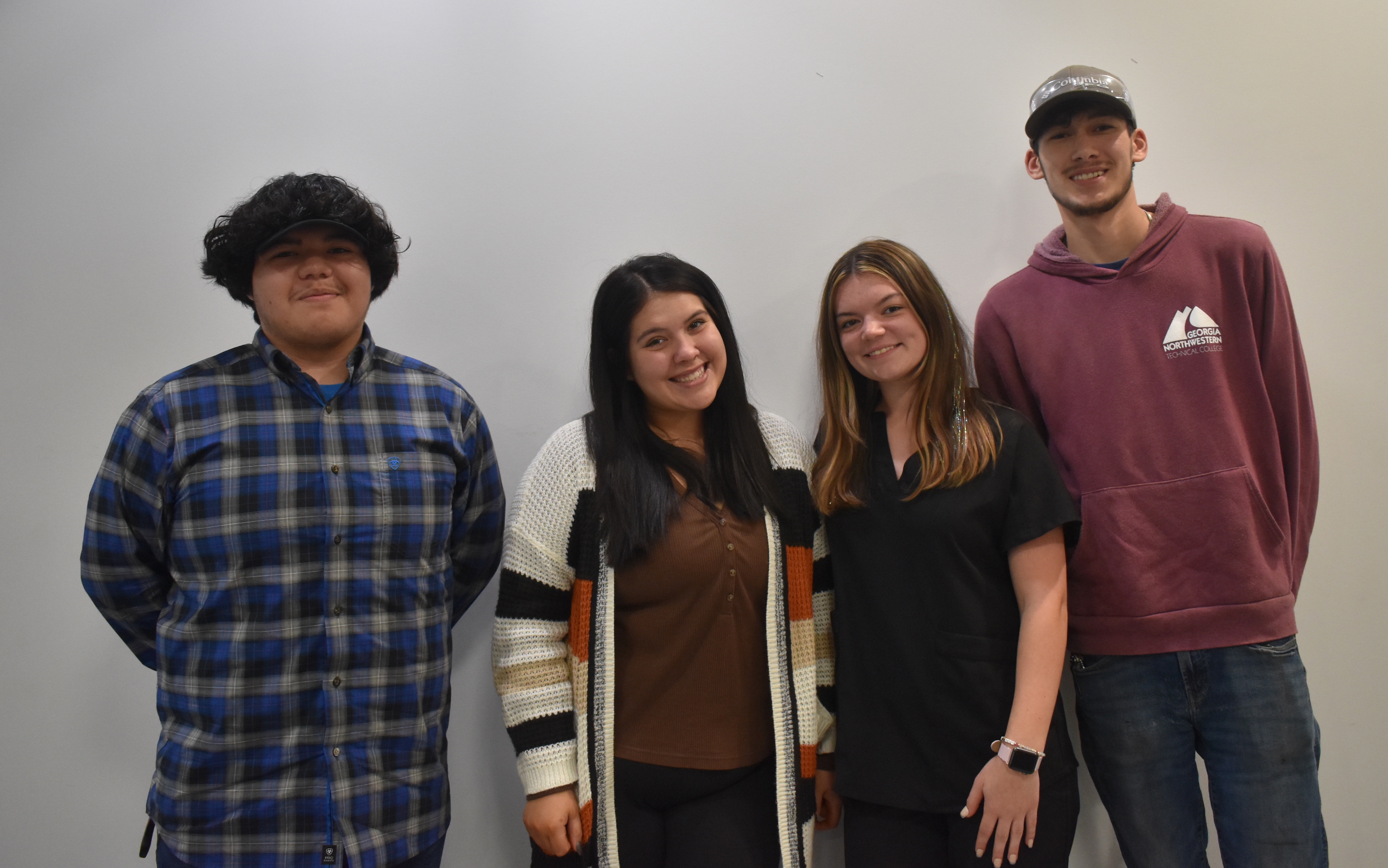 Staff Photo by Andrew Wilkins / From left, Daryl Vazquez, Selena Rodiguez, Emma Funderburk and Aiden Jones, all students in the Walker County school district's Launch program, are photographed at a luncheon about the program Thursday.