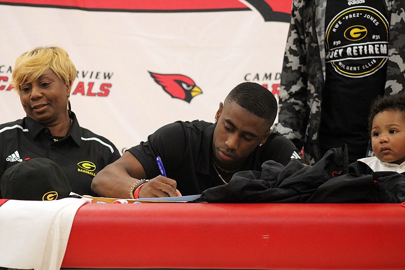 Photo By: Michael Hanich
Camden Fairview shortstop/outfielder Martavius Thomas signing his letter of intent to Grambling State University.