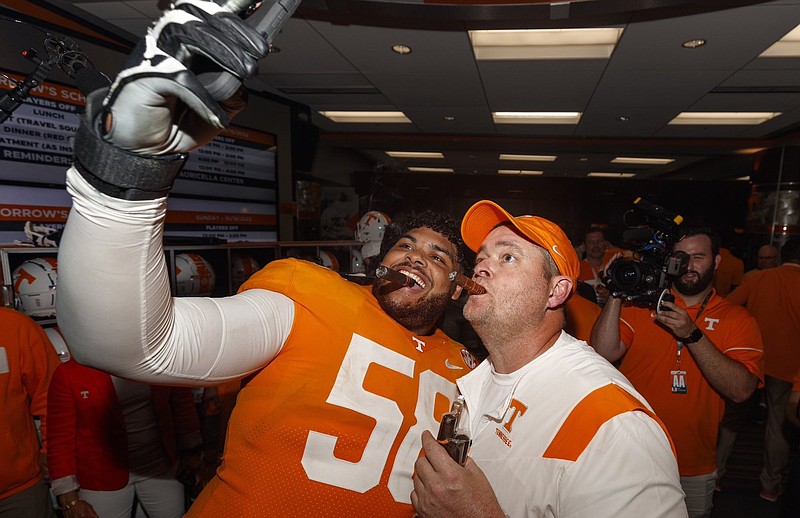 Tennessee Athletics photo / Tennessee offensive tackle Darnell Wright, shown taking a selfie with Volunteers coach Josh Heupel after last October’s 52-49 win over Alabama in Knoxville, was picked by the Chicago Bears on Thursday night as the 10th overall selection of the NFL draft.