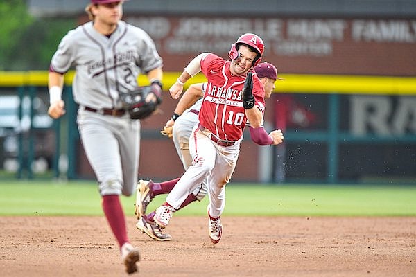 WholeHogSports - Former Hogs struggle at Friday combine