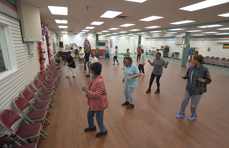 Staff photo by Matt Hamilton / Seniors participate in a line dancing class at the Eastgate Senior Center on Friday, April 28, 2023.