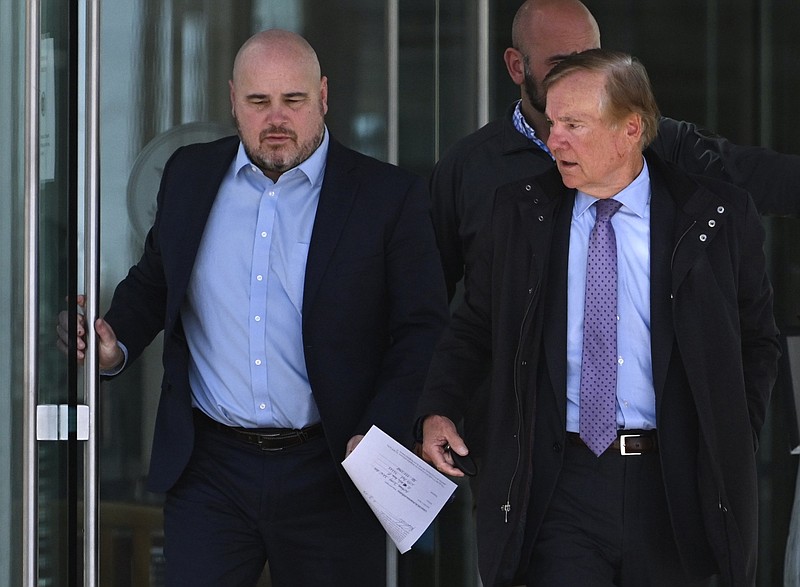 Former Arkansas Sen. Jeremy Hutchinson, left, leaves the federal courthouse in Little Rock with his father, former U.S. Sen. Tim Hutchinson, Friday, Feb. 3, 2023..(Arkansas Democrat-Gazette/Staci Vandagriff)