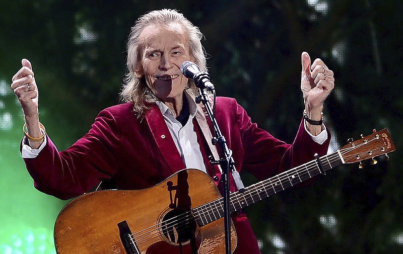 Gordon Lightfoot performs during the evening ceremonies of Canada's 150th anniversary of Confederation, in Ottawa, Ontario, on July 1, 2017. The legendary folk singer-songwriter, whose hits including “Early Morning Rain,” and “The Wreck of the Edmund Fitzgerald," told a tale of Canadian identity that was exported worldwide, died on Monday, May 1, 2023, at a Toronto hospital, according to a family representative. He was 84. (Sean Kilpatrick/The Canadian Press via AP)