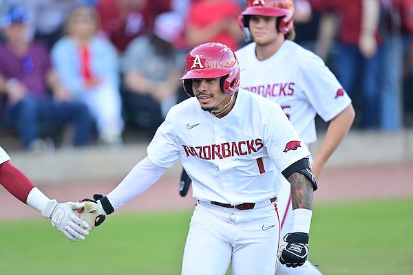 Arkansas infielder Harold Coll (1) runs the bases after hitting a home run during a game against Lipscomb on Tuesday, May 2, 2023, in North Little Rock.
