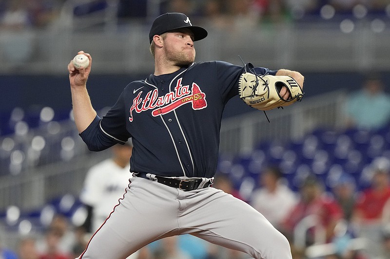 Atlanta Braves starting pitcher Bryce Elder (55) aims a pitch during the first inning of a baseball game against the Miami Marlins, Tuesday, May 2, 2023, in Miami. (AP Photo/Marta Lavandier)