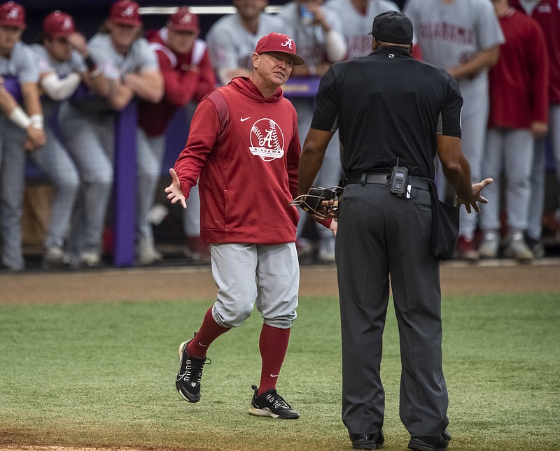 The Advocate photo by Michael Johnson via AP / Alabama baseball coach Brad Bohannon argues with plate umpire Joe Harris after being ejected in the bottom of the second inning during an SEC game at LSU on April 29 in Baton Rouge, La.