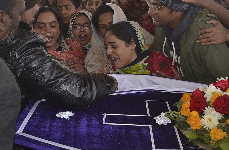 Pakistani Christians mourn beside the casket of their family member, one of nine people killed in a terrorist attack on Bethel Memorial Methodist Church in Quetta, Pakistan on Dec. 17, 2017. The U.S. Commission on International Religious Freedom is recommending that Pakistan and 16 other countries be placed on the State Department’s list of “countries of particular concern,” for engaging in or tolerating “systematic, egregious, and ongoing violations of religious freedom” that is “particularly severe.”
(AP file photo)