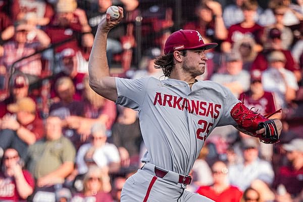 Arkansas pitcher Brady Tygart throws during a game against Mississippi State on Saturday, May 6, 2023, in Starkville, Miss.