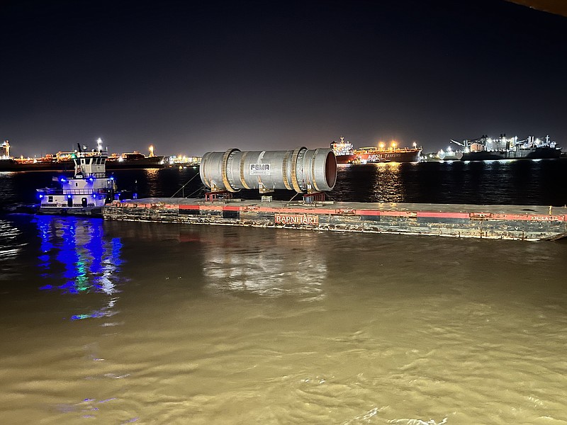 A kiln furnace sits on a barge on the Mississippi River. The furnace will be transported from Crossett to Gum Springs this week during a six-day trip on state roads and highways.
(Photo courtesy of Veolia)