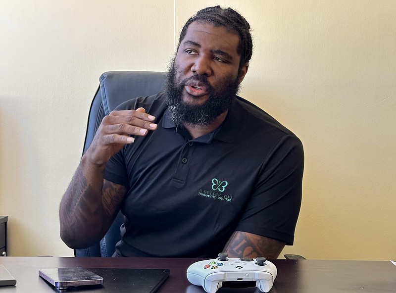 Chukwuma Ekeh, who works at A Better You Therapeutic Solutions in downtown Little Rock, is shown in his office on Wednesday, May 3, 2023. Ekeh is one of the few Black therapists in Central Arkansas. (Arkansas Democrat-Gazette/Aaron Gettinger)