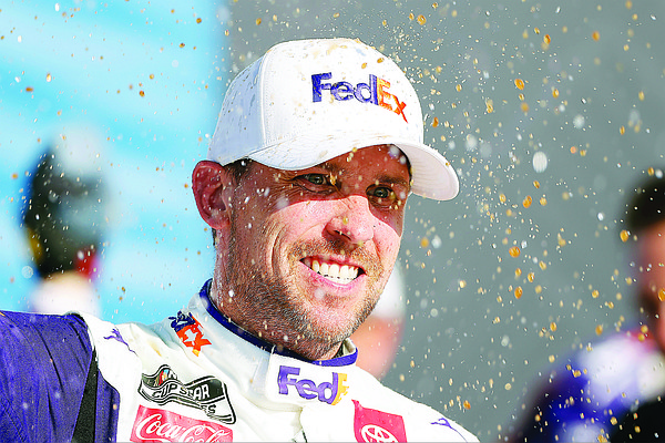 Hamlin bumps Larson for lead to win at Kansas Speedway Hamlin bumps Larson for lead to win at Kansas Speedway