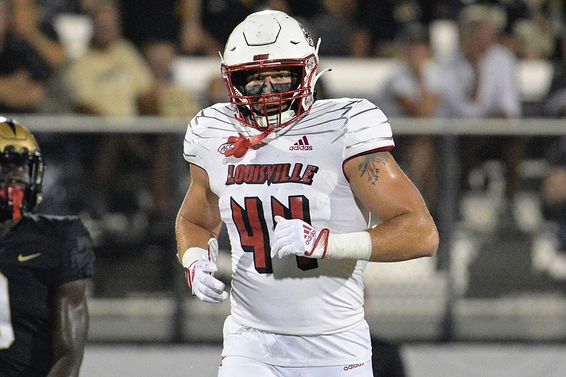 Louisville tight end Francis Sherman (44) sets up for a play during the first half of an NCAA college football game against Central Florida on Friday, Sept. 9, 2022, in Orlando, Fla. (AP Photo/Phelan M. Ebenhack)