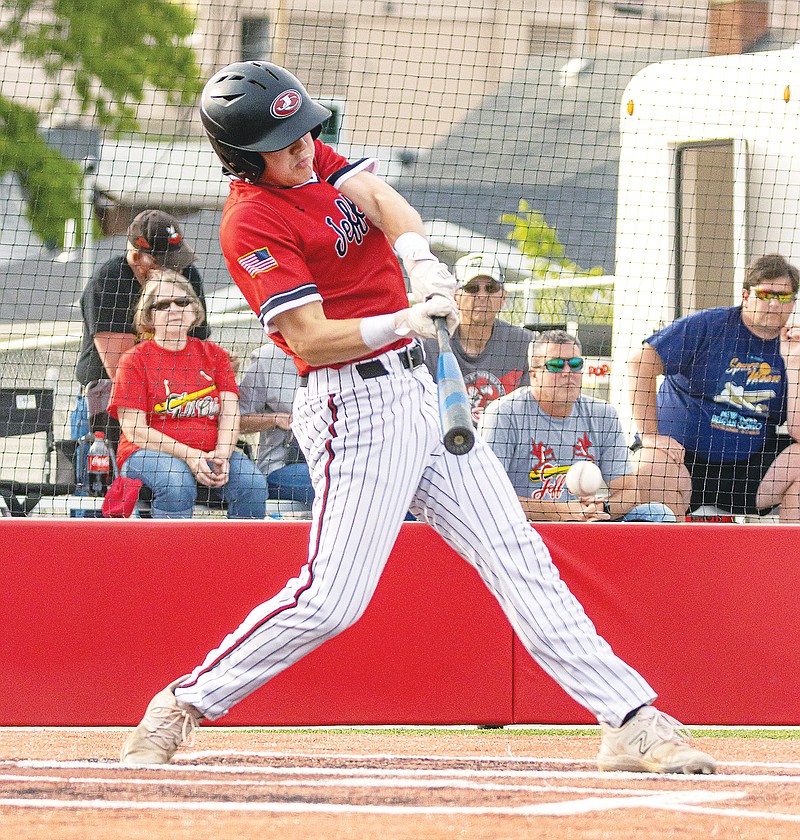 Jefferson City's Brody Johns makes contact during an at-bat in Tuesday’s game against Father Tolton at Jefferson City High School. (Josh Cobb/News Tribune)