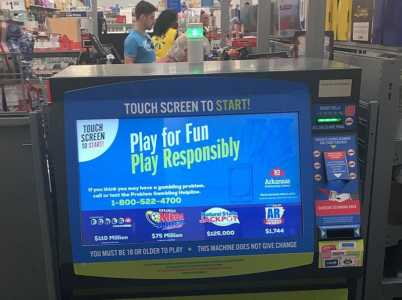 An Arkansas Scholarship Lottery touch-screen machine is shown inside an Arkansas Walmart in this March 10, 2020 file photo. (Arkansas Democrat-Gazette/Michael R. Wickline)