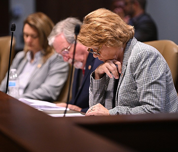 Rep. Carol Dalby, R-Texarkana, looks over papers during the Legislative Joint Auditing Committee meeting Friday at the Multi-Agency Complex near the state Capitol in Little Rock.
(Arkansas Democrat-Gazette/Staci Vandagriff)