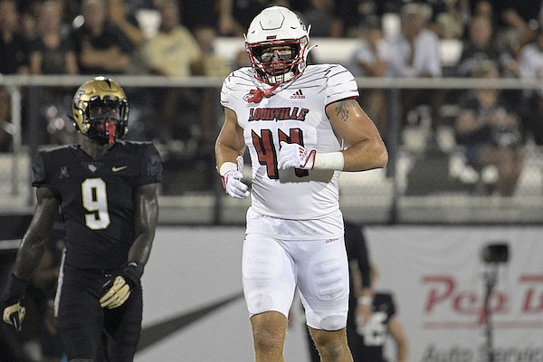 Louisville tight end Francis Sherman (44) sets up for a play during the first half of an NCAA college football game against Central Florida on Friday, Sept. 9, 2022, in Orlando, Fla. (AP Photo/Phelan M. Ebenhack)