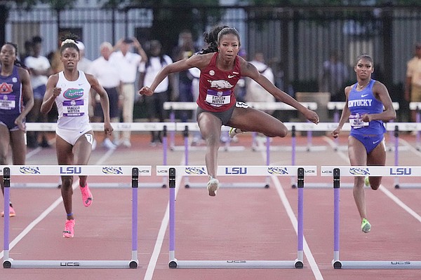 Arkansas' Britton Wilson runs the 400-meter hurdles during the SEC Outdoor Track and Field Championships on Saturday, May 13, 2023, in Baton Rouge, La.