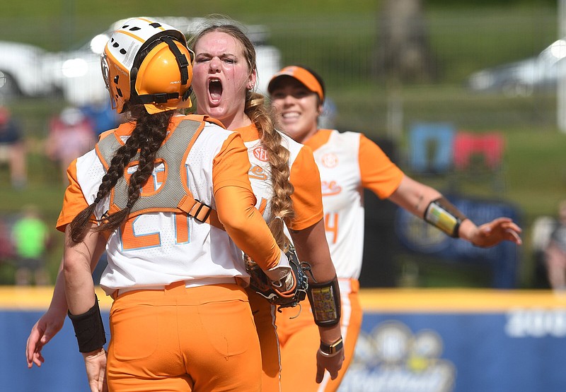 Tennesseeâ€™s pitcher Ashley Rogers (center) and catcher Giulia Koutsoyanopulos (left) celebrate with McKenna Gibson (right) after beating South Carolina 3-1 Saturday May 13, 2023 in the final game in the SEC Softball Tournament at Bogle Field in Fayetteville. Visit nwaonline.com/photo for today's photo gallery.   (NWA Democrat-Gazette/J.T. Wampler).