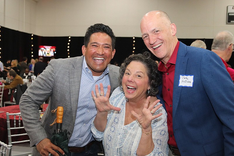 R.J. Martino with Deb and Peter McIndoe at the 18th annual Taste of Little Rock, benefiting the University of Arkansas at Little Rock Association Scholarship Fund and held April 25 in the university's Jack Stephens Center..(Arkansas Democrat-Gazette -- Helaine R. Williams)