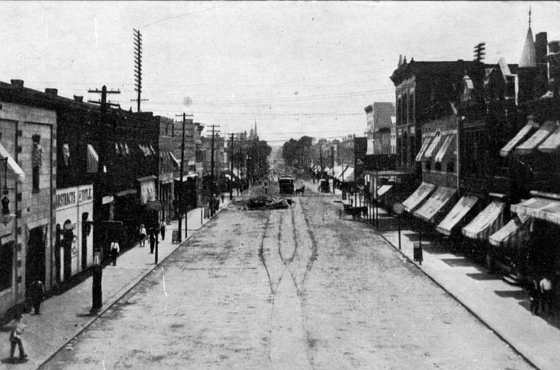 The view of Main Street in Pine Bluff, looking south, is shown in this circa 1907 file photo. The street had apparently not yet been paved, but streetcar tracks were already in place, including a split allowing cars to pass each other. (Courtesy photo)