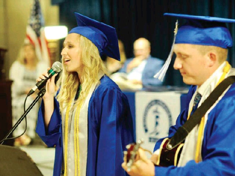 Caitlyn Thompson sings "Goodness of God" to accompaniment from Avery Koelling on Sunday, May 14, 2023, during the 2023 graduation ceremonies for Lighthouse Preparatory Academy in Jefferson City. (Joe Gamm/News Tribune photo)