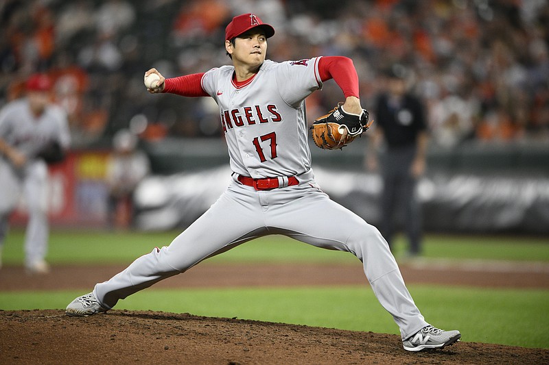 Los Angeles Angels starting pitcher Shohei Ohtani throws during the sixth inning of a baseball game against the Baltimore Orioles, Monday, May 15, 2023, in Baltimore. (AP Photo/Nick Wass)