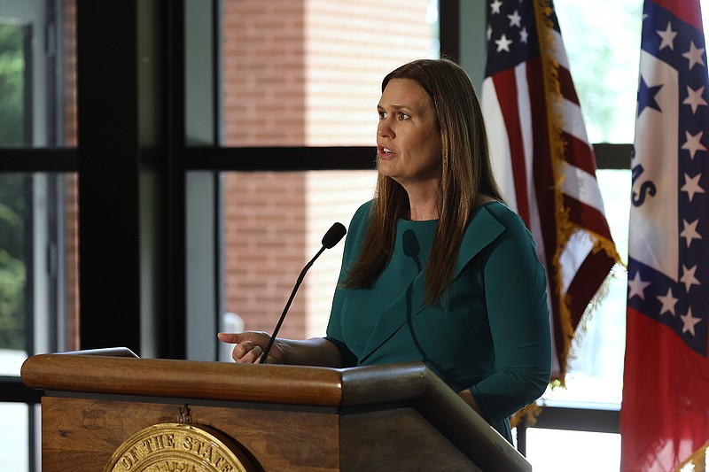 Gov. Sarah Huckabee Sanders spekas a ceremonial bill signing ceremony at Little Rock Air Force Base in Jacksonville in this May 9, 2023 file photo.(Arkansas Democrat-Gazette/Thomas Metthe)