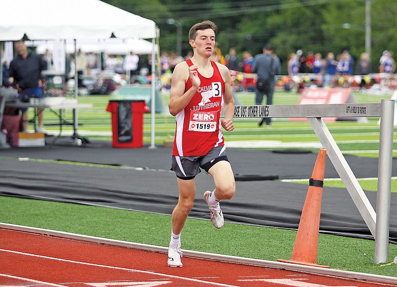 Calvary Lutheran’s Kyle Hagemeyer crosses the finish line in the boys 1,600-meter run in last year’s Class 2 boys track and field state championships at Adkins Stadium. (Greg Jackson/News Tribune)