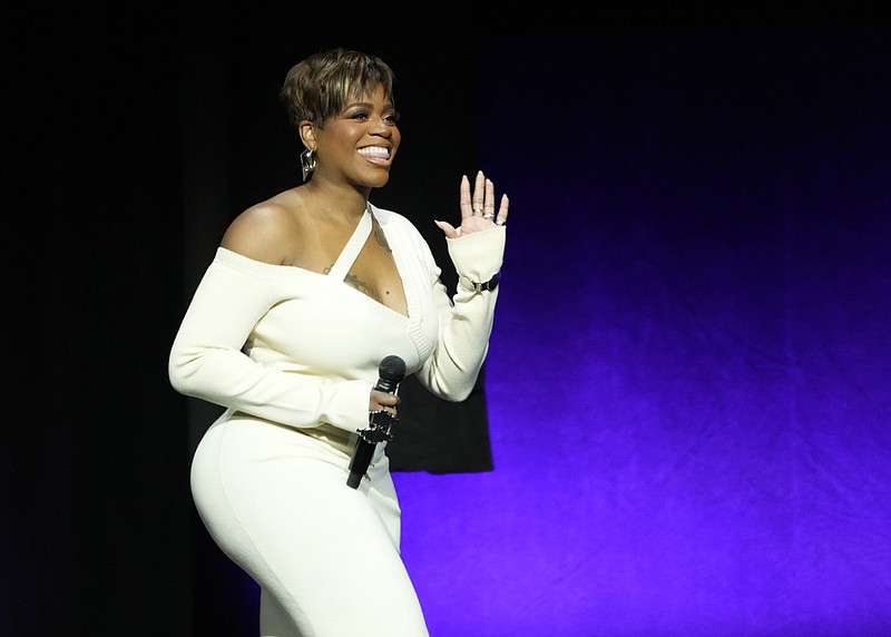 Fantasia Barrino waves to the audience at CinemaCon 2023, the official convention of the National Association of Theatre Owners (NATO) at Caesars Palace, Tuesday, April 25, 2023, in Las Vegas. (AP Photo/Chris Pizzello)