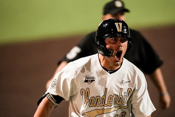 Vanderbilt designated hitter Troy LaNeve celebrates a home run during the eighth inning of a game against Arkansas on Friday, May 19, 2023, in Nashville, Tenn.