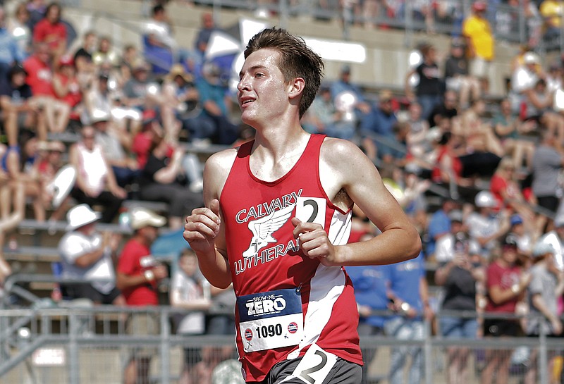 Calvary Lutheran's Kyle Hagemeyer runs past the crowd during the boys 3,200-meter run Saturday in the Class 2 track and field state championships at Adkins Stadium. (Kate Cassady/News Tribune)