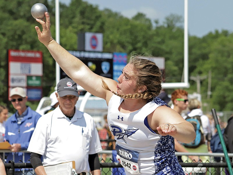 Russellville’s Trinity Riggs throws a shot during the girls shot put Saturday in the Class 2 track and field state championships at Adkins Stadium. (Kate Cassady/News Tribune)
